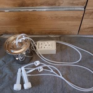 Hucow. Brüste melken. Bauernhof